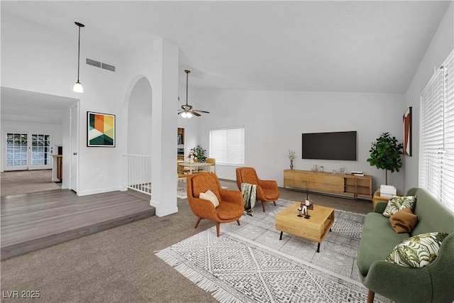 1913 Piccolo Way, Las Vegas, NV 89146 - living room with ceiling fan, arched walkways, healthy amount of natural light, carpet, and high vaulted ceiling