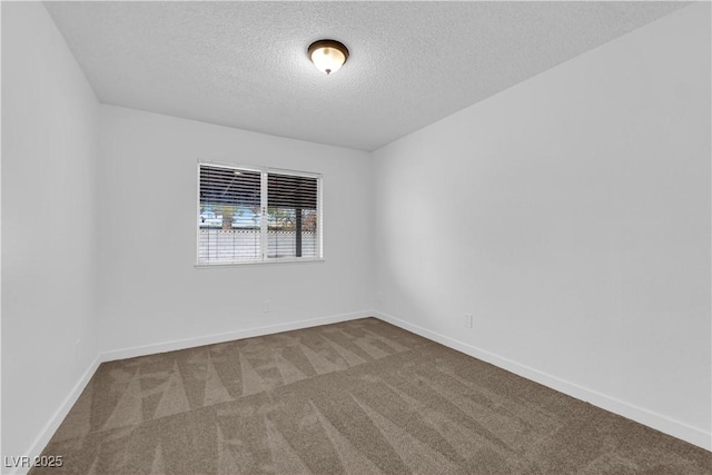 1913 Piccolo Way, Las Vegas, NV 89146 - empty room with carpet floors, a textured ceiling, and baseboards