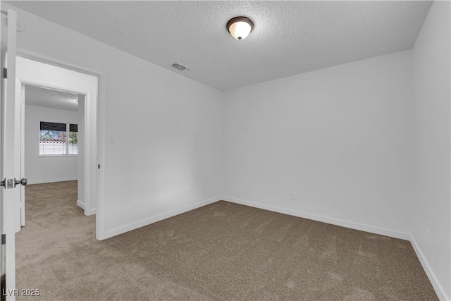 1913 Piccolo Way, Las Vegas, NV 89146 - empty room featuring carpet flooring, a textured ceiling, and baseboards