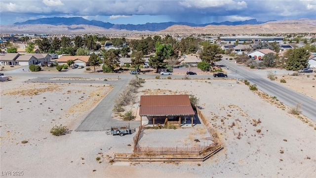 bird's eye view featuring a residential view and a mountain view