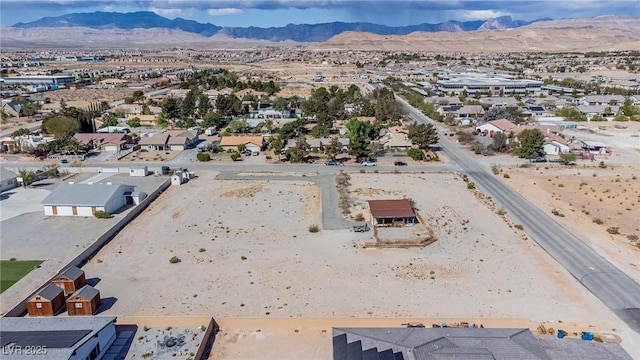 bird's eye view with a residential view and a mountain view