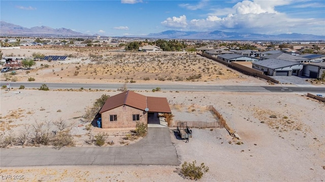 bird's eye view featuring view of desert and a mountain view
