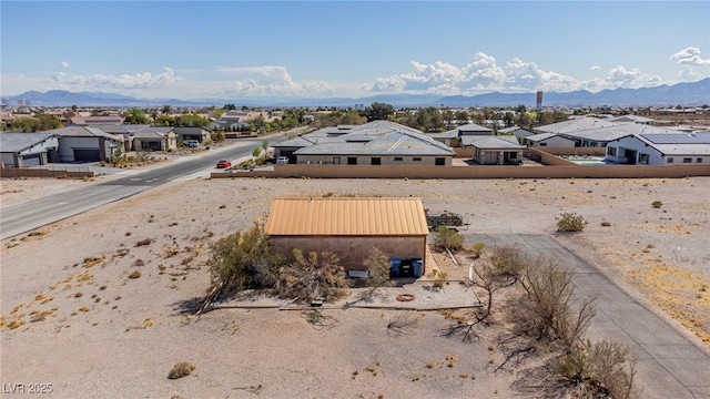 exterior space featuring a residential view and a mountain view