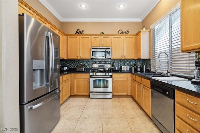 kitchen featuring light tile patterned floors, a sink, dark countertops, stainless steel appliances, and decorative backsplash