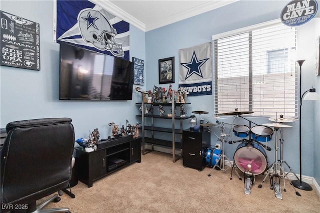 carpeted home office featuring crown molding