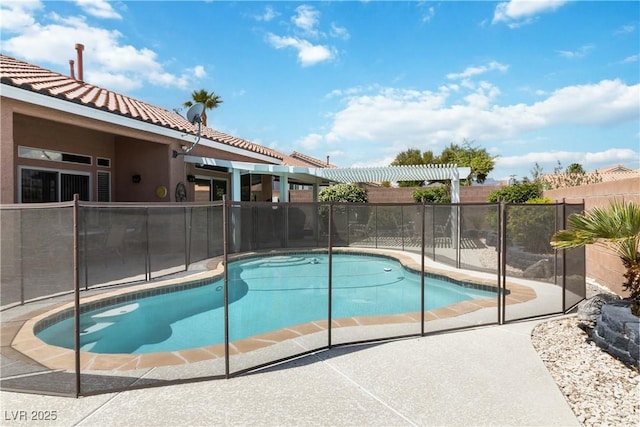 view of pool featuring a fenced in pool and fence