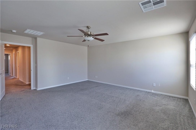 carpeted empty room featuring a ceiling fan, baseboards, and visible vents
