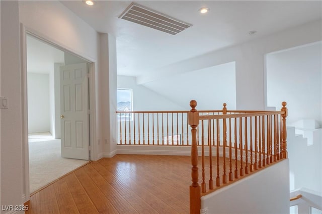 787 Craigmark Ct, Henderson, NV 89002 - hall featuring wood-type flooring, an upstairs landing, recessed lighting, and baseboards