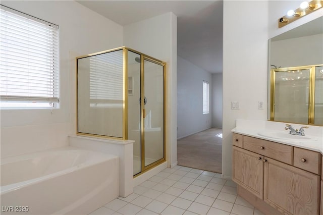 787 Craigmark Ct, Henderson, NV 89002 - full bath with a shower stall, vanity, a garden tub, and tile patterned floors