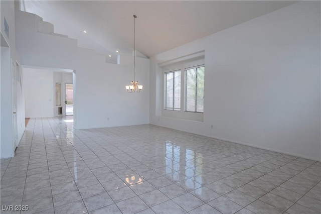 787 Craigmark Ct, Henderson, NV 89002 - unfurnished room featuring a chandelier, healthy amount of natural light, lofted ceiling, and light tile patterned floors
