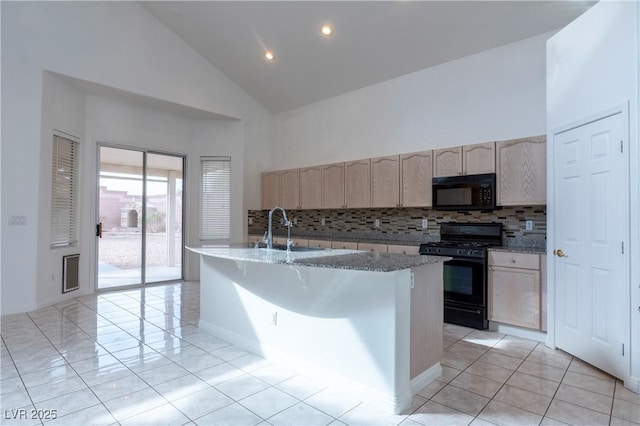 787 Craigmark Ct, Henderson, NV 89002 - kitchen with black appliances, a sink, high vaulted ceiling, decorative backsplash, and light stone counters