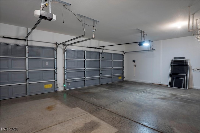 787 Craigmark Ct, Henderson, NV 89002 - garage featuring a garage door opener and baseboards
