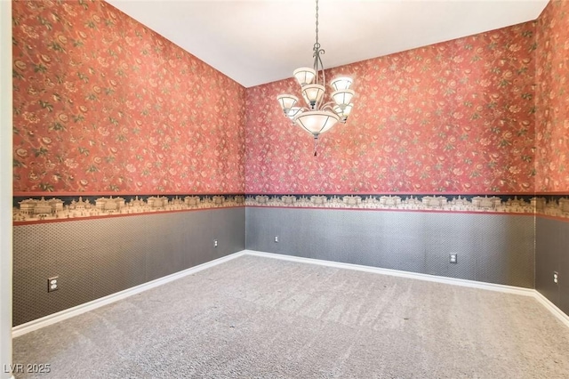 3910 Internet Ave, North Las Vegas, NV 89031 - unfurnished room with carpet, wallpapered walls, a chandelier, and baseboards