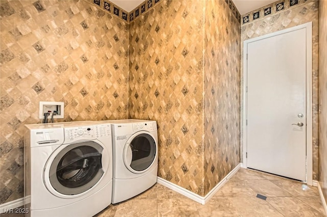 3910 Internet Ave, North Las Vegas, NV 89031 - laundry room featuring independent washer and dryer, baseboards, and wallpapered walls
