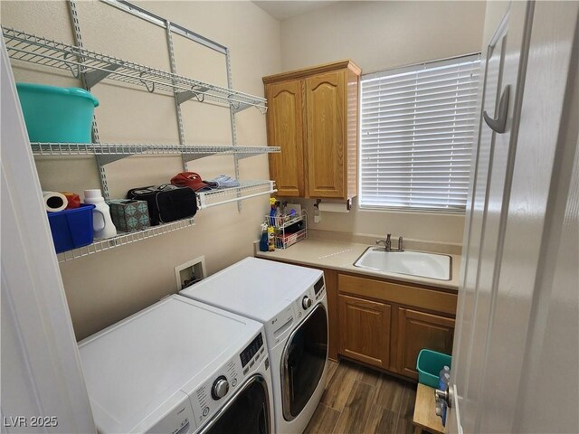 2809 Winslow Springs Dr, Henderson, NV 89052 - laundry room with separate washer and dryer, dark wood-style floors, and cabinet space