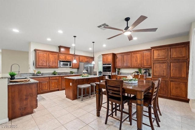 6335 Iginlas Goal Ave, Las Vegas, NV 89131 - dining area featuring recessed lighting, a ceiling fan, light tile patterned floors, and visible vents