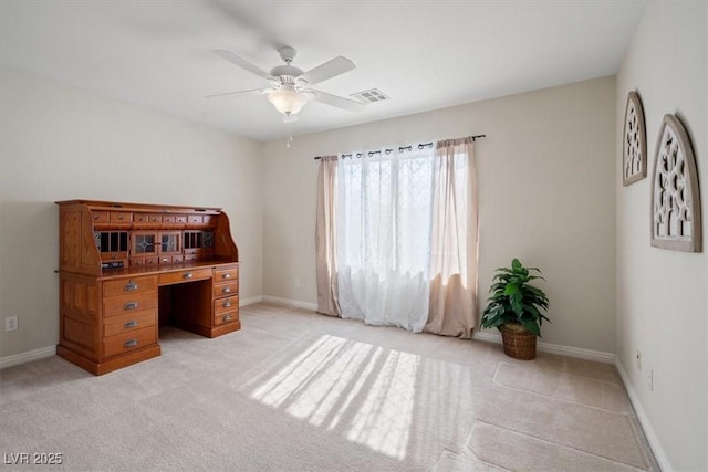 6335 Iginlas Goal Ave, Las Vegas, NV 89131 - office area with visible vents, a ceiling fan, baseboards, and light carpet