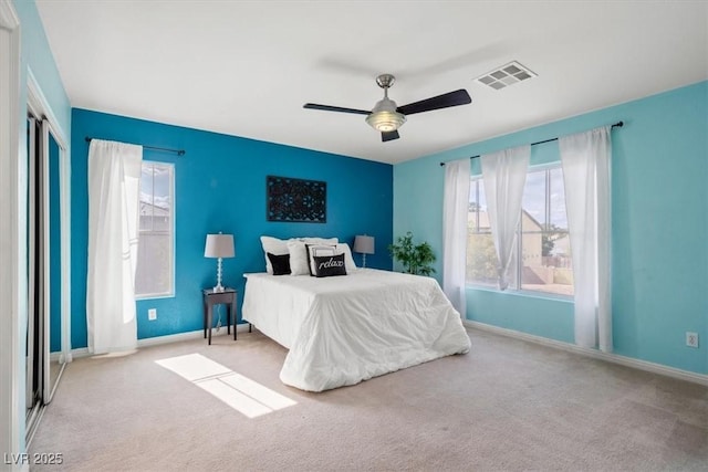 6335 Iginlas Goal Ave, Las Vegas, NV 89131 - bedroom with carpet floors, baseboards, a ceiling fan, and visible vents