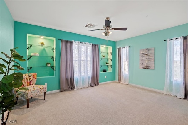 6335 Iginlas Goal Ave, Las Vegas, NV 89131 - sitting room featuring baseboards, ceiling fan, carpet flooring, and visible vents