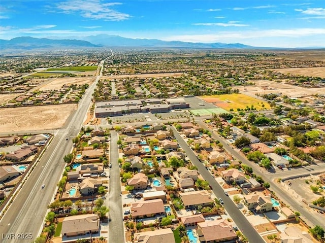 6335 Iginlas Goal Ave, Las Vegas, NV 89131 - drone / aerial view with a mountain view and a residential view