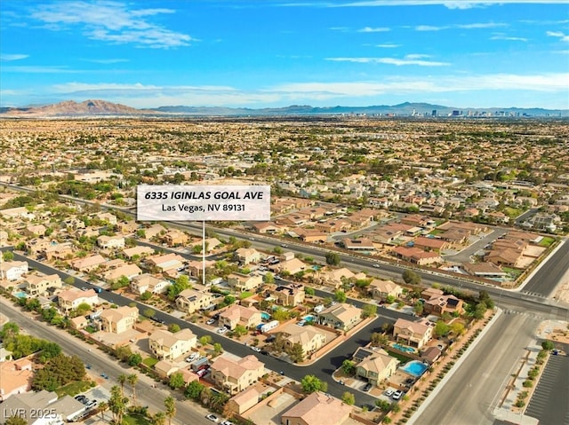 6335 Iginlas Goal Ave, Las Vegas, NV 89131 - drone / aerial view with a residential view and a mountain view