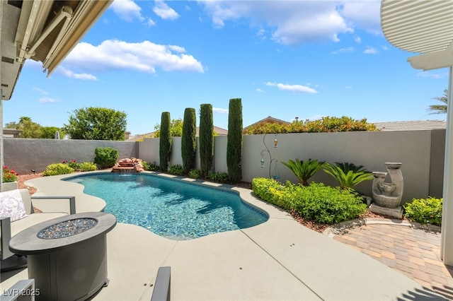 view of pool with a fenced backyard, a patio, and a fenced in pool