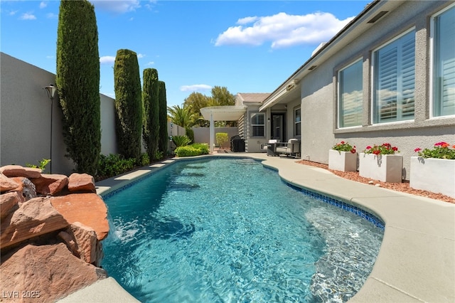 view of swimming pool featuring a patio, a fenced backyard, and a fenced in pool