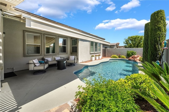 view of pool featuring a fenced backyard, a patio area, outdoor lounge area, and a fenced in pool