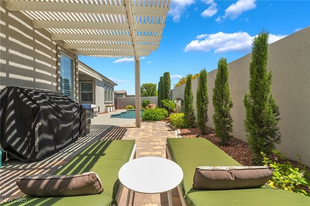 view of patio / terrace featuring a grill, a pergola, a fenced in pool, and a fenced backyard