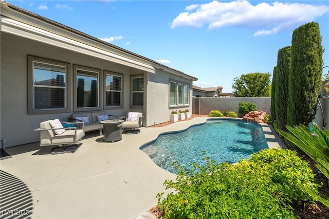 view of swimming pool featuring a fenced backyard, an outdoor living space with a fire pit, a patio, and a fenced in pool