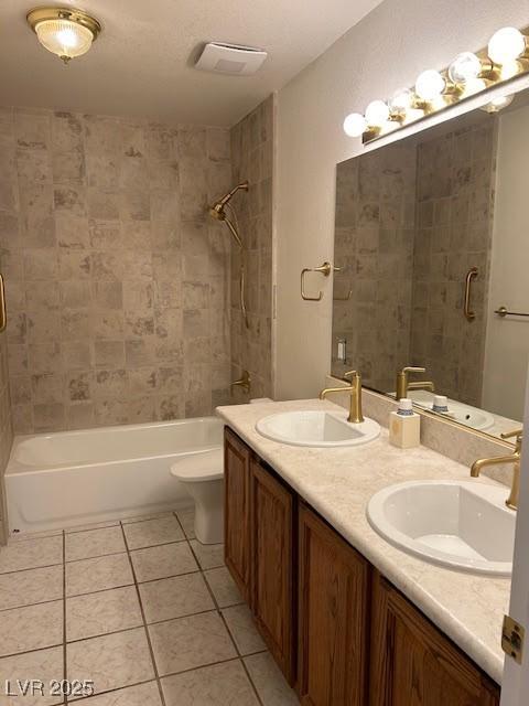 7650 Butterscotch Ct, Las Vegas, NV 89131 - bathroom featuring tile patterned flooring, double vanity, and bathing tub / shower combination