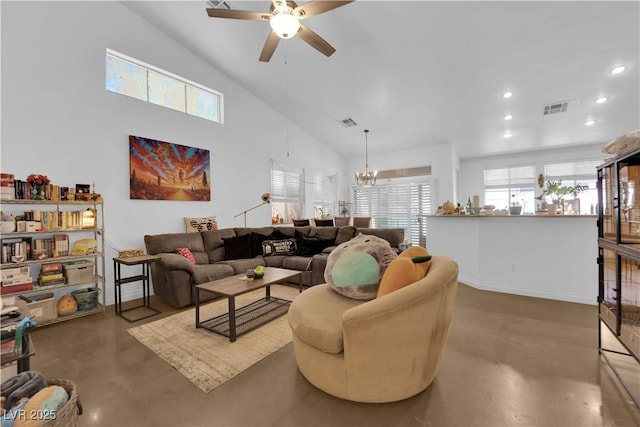living area with visible vents, concrete floors, ceiling fan with notable chandelier, and high vaulted ceiling