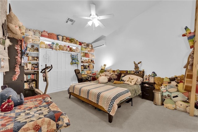 bedroom with ceiling fan, a wall mounted air conditioner, carpet, lofted ceiling, and visible vents