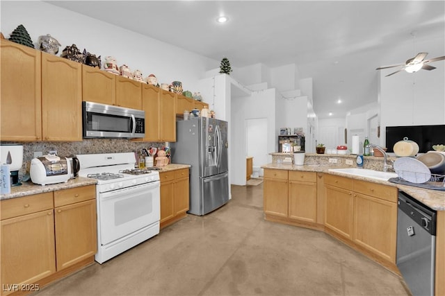 kitchen featuring backsplash, a ceiling fan, appliances with stainless steel finishes, a sink, and concrete floors