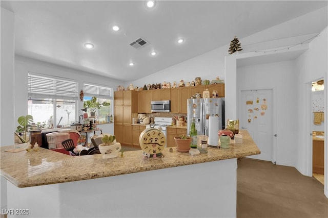 kitchen featuring backsplash, visible vents, appliances with stainless steel finishes, vaulted ceiling, and recessed lighting