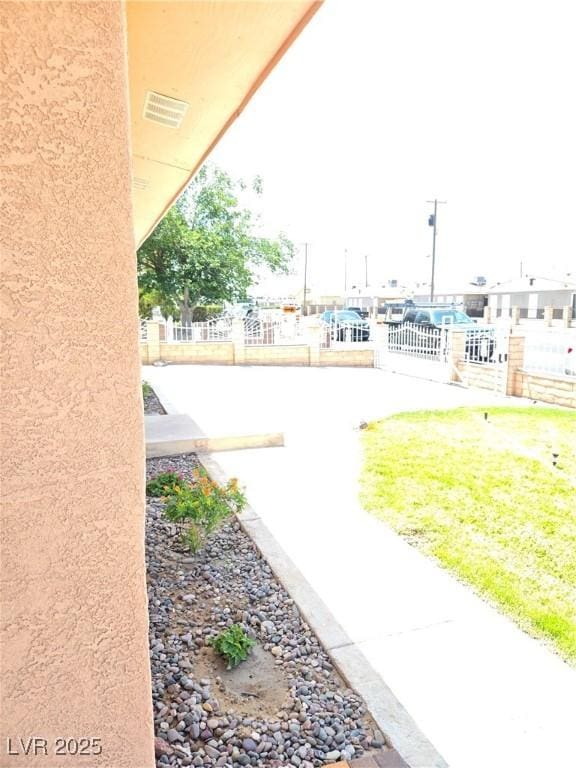 view of yard featuring fence