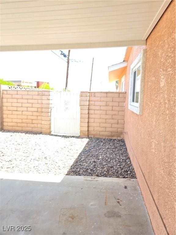 view of patio / terrace with fence