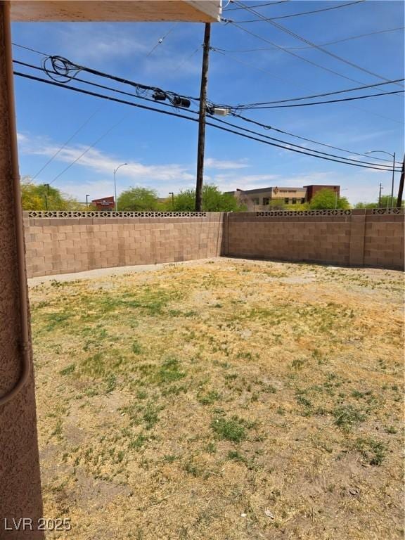 view of yard featuring a fenced backyard
