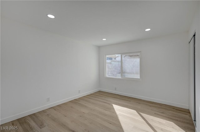 4419 Fairmont Cir, Las Vegas, NV 89147 - unfurnished bedroom with recessed lighting, baseboards, and light wood-style flooring