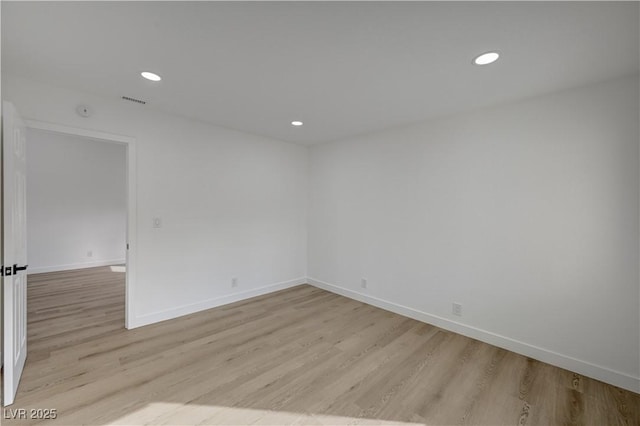 4419 Fairmont Cir, Las Vegas, NV 89147 - spare room with recessed lighting, baseboards, and light wood-type flooring