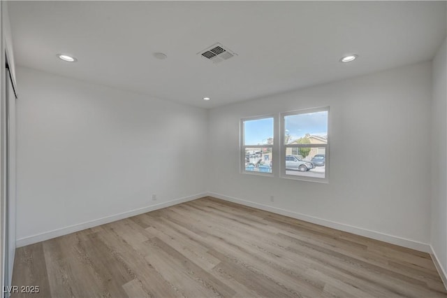 4419 Fairmont Cir, Las Vegas, NV 89147 - unfurnished room featuring visible vents, recessed lighting, and light wood-style flooring