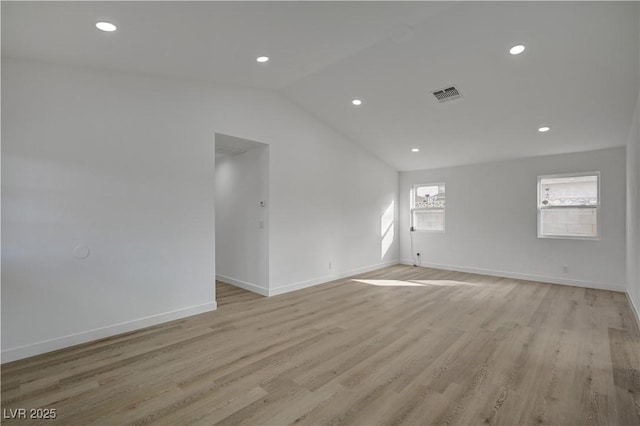 4419 Fairmont Cir, Las Vegas, NV 89147 - empty room featuring visible vents, recessed lighting, vaulted ceiling, and light wood-type flooring