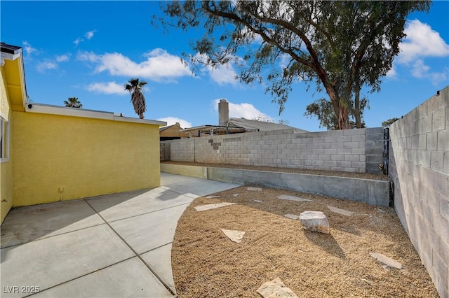 4419 Fairmont Cir, Las Vegas, NV 89147 - view of yard featuring a fenced backyard and a patio area