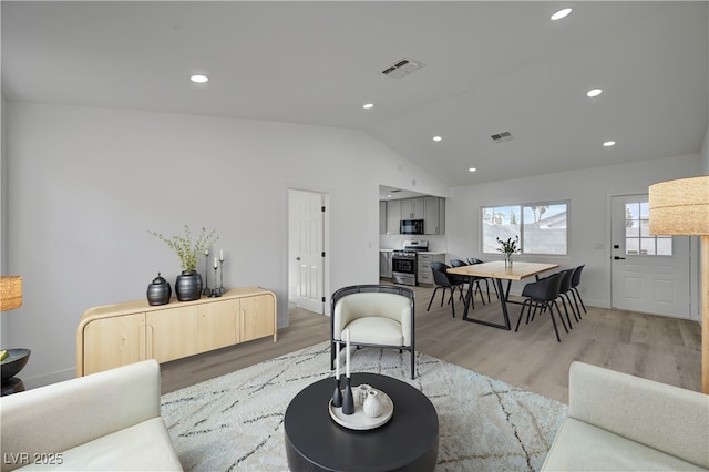 4419 Fairmont Cir, Las Vegas, NV 89147 - living area featuring recessed lighting, visible vents, light wood finished floors, and lofted ceiling