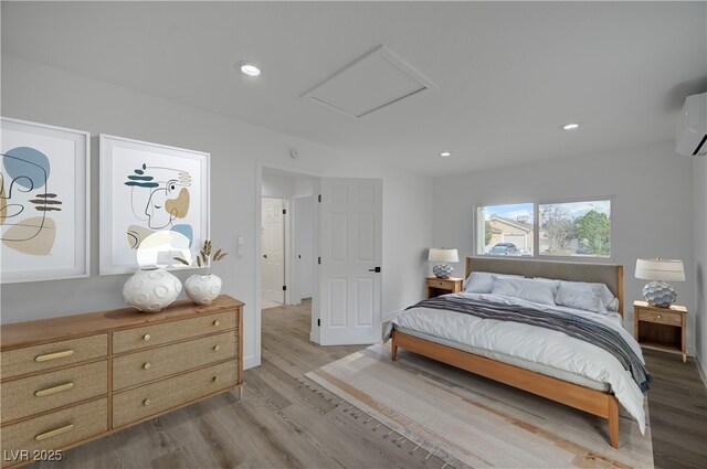 4419 Fairmont Cir, Las Vegas, NV 89147 - bedroom featuring recessed lighting, light wood-style flooring, and attic access