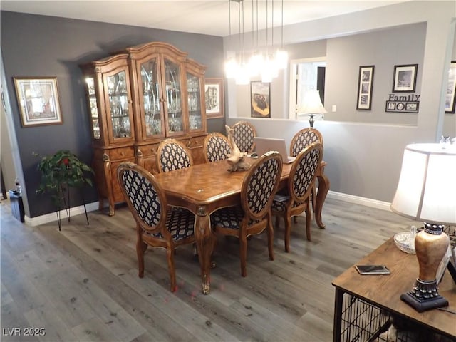 4361 Duck Harbor Ave, North Las Vegas, NV 89031 - dining area featuring baseboards and light wood finished floors