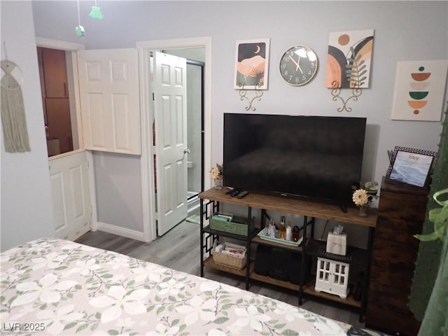 4361 Duck Harbor Ave, North Las Vegas, NV 89031 - bedroom with baseboards and wood finished floors