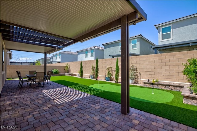 view of patio with a fenced backyard and a pergola