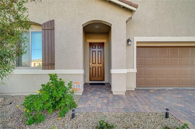 10251 Tiger Milkweed St, Las Vegas, NV 89141 - entrance to property featuring stucco siding and a garage