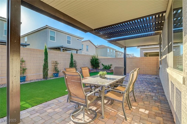 10251 Tiger Milkweed St, Las Vegas, NV 89141 - fenced backyard featuring a patio, a pergola, and outdoor dining space